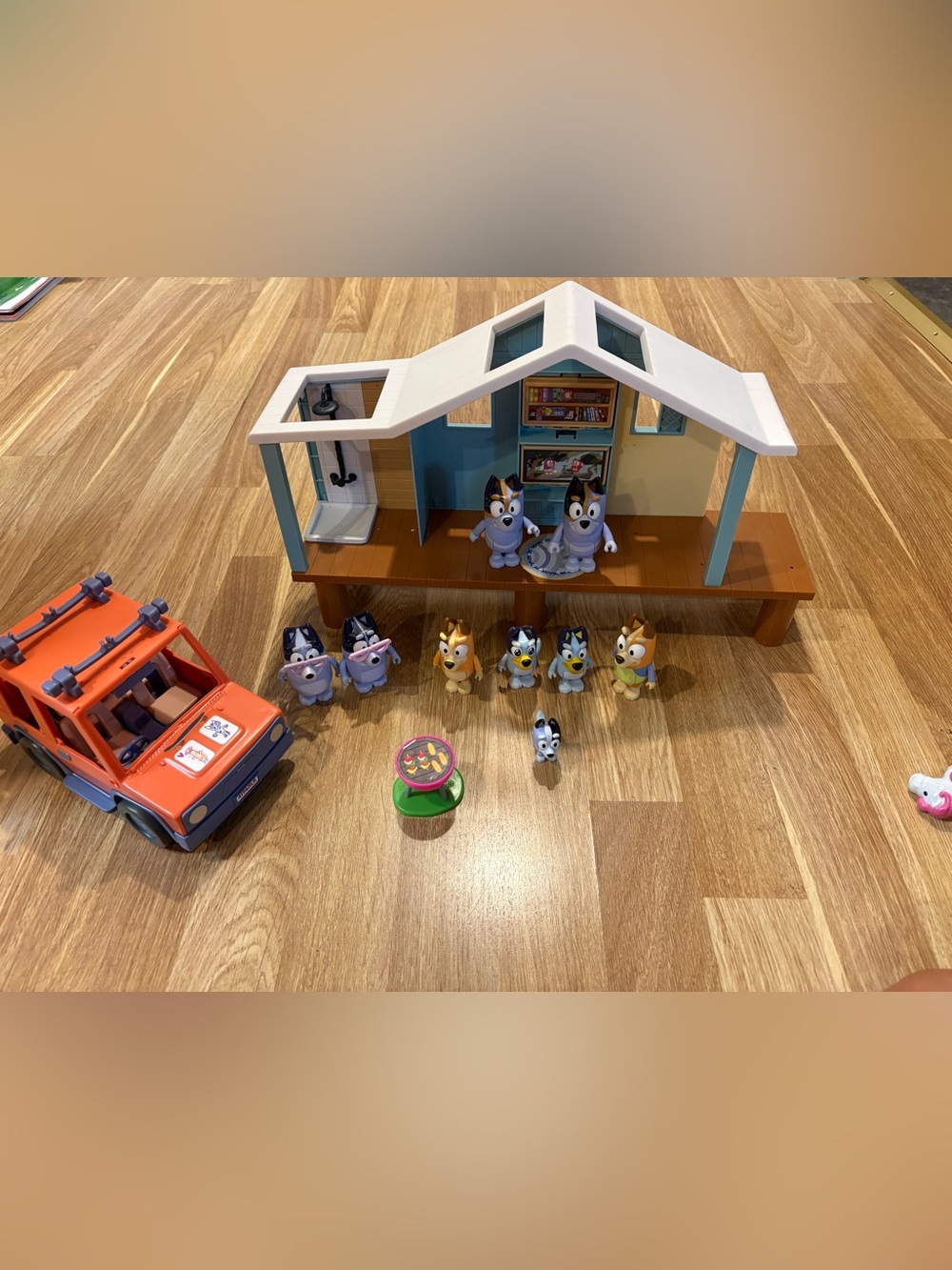 Bluey Family Playset with White and Blue House and Multicolor Figures